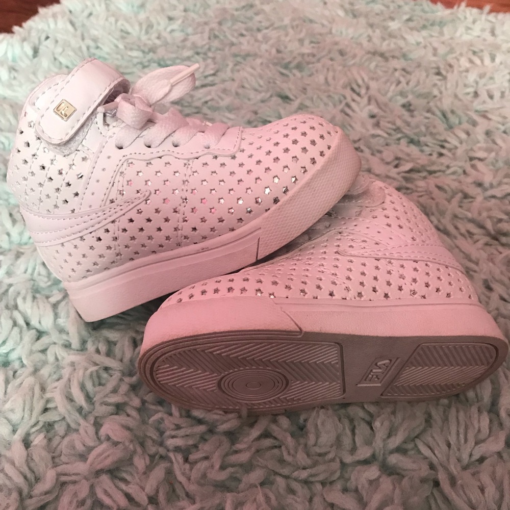 High top Fila sneakers with silver stars